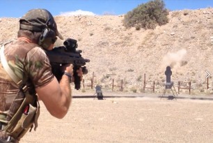 Shooter engaging the Jedburgh Target System at Gunsite Shooter engaging the Jedburgh Target System at Gunsite