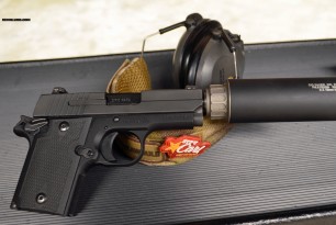 Sig 938 with a short 9mm can