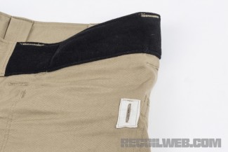 That little square with the slit in it is the backside of the reinforced media cable port.