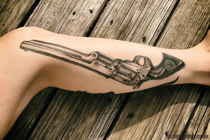 clint eastwood gun tattoo