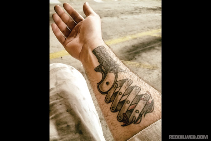 taxi driver gun tattoo
