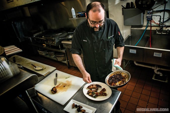 Steve Roberts, the executive chef at Bolton Valley Ski Resort in northern Vermont, sears a duck breast with a bit of Harpoon Camp Wannamango. The pale ale pairs well with the duck because of its light body, slight hop bitterness, and malty sweetness.