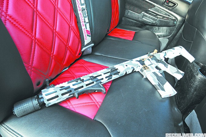 toyota-tacoma-trd-sport-interior-rifle-on-seats