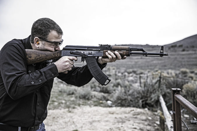 Gary Hughes helps out by test firing the newly built RECOIL Custom AKM.