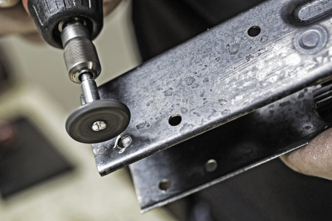 Deburring the rivet holes ensures the rivets seat properly for the strongest connection while also looking good.