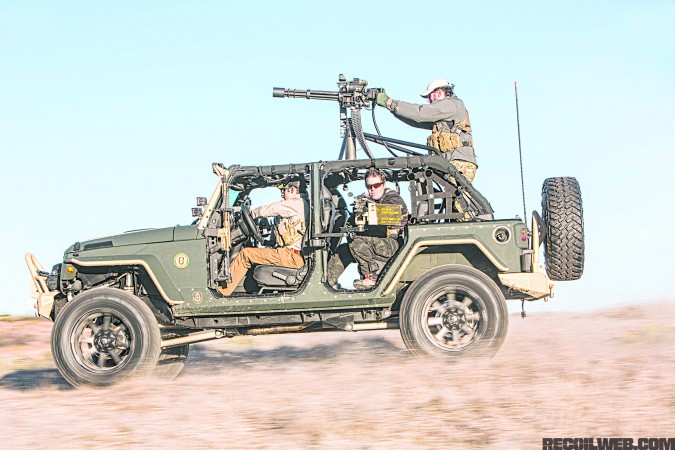 2014-jeep-jk-rubicon-profile-with-men-with-guns