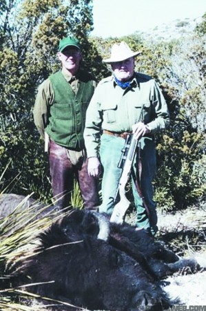 Clint Smith, left, and Jeff Cooper hunt American Bison.