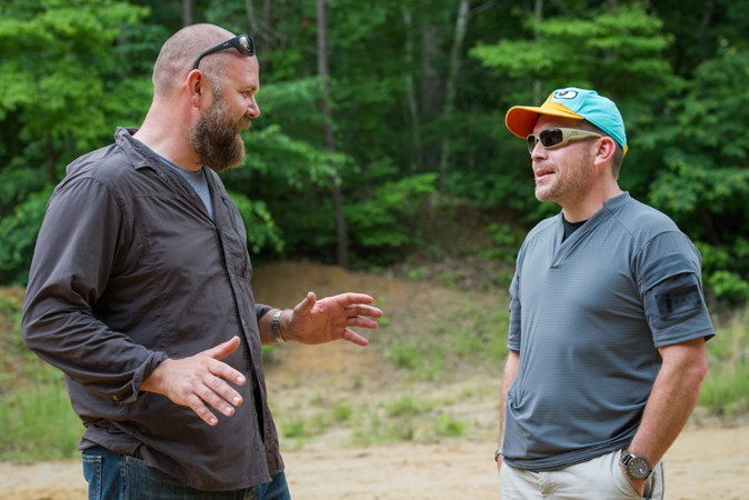 Matt explaining something to me - yes that is a Perry the Platypus hat. There's a story behind that.