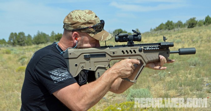 Tim Humston, owner and founder, tests an SAS can on a Tavor