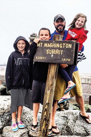Brittingham with his children, Aiden, Reese and Ryan atop Mount Washington, in New Hampshire during the summer of 2015.
