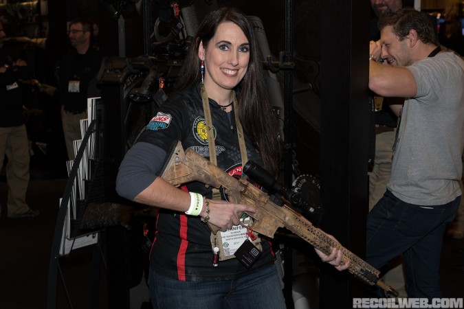 Jennifer-Seymour-3-Gun-Competitor holding the CAS-22 by Lanxang Tactical