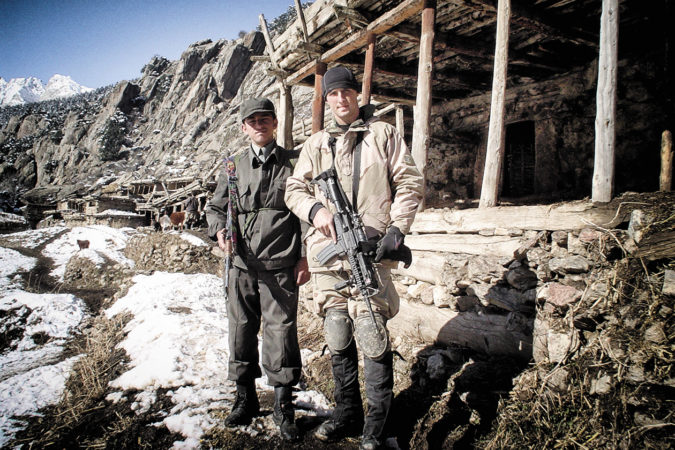 Griffin and a young Afghan policeman during a patrol in Konar Province, Afghanistan in December 2003.