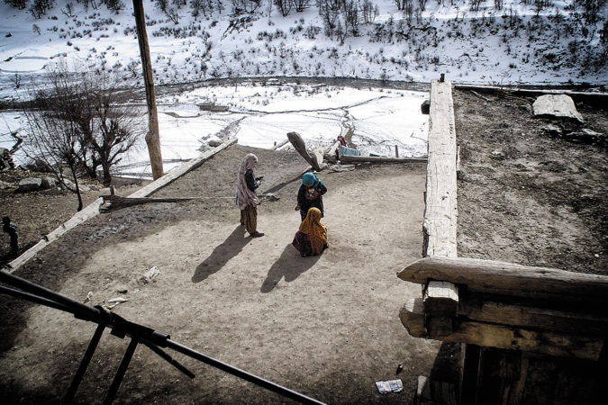 Griffin photographed these little girls playing one morning on the roof of a building his team was using in Afghanistan in 2003. The view affected the way he saw the Afghan people.
