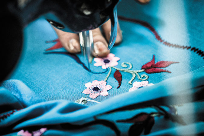 CFF-embroidered products are sourced from a women owned and operated factory in Kabul, Afghanistan. Each sarong takes roughly six hours in manufacturing to complete — no digital work anywhere.