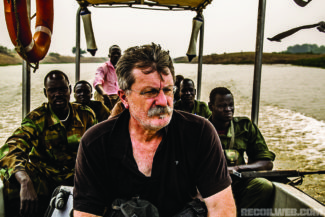 Robert Young Pelton rides a boat with rebels from Akobo to Nasir, S Sudan