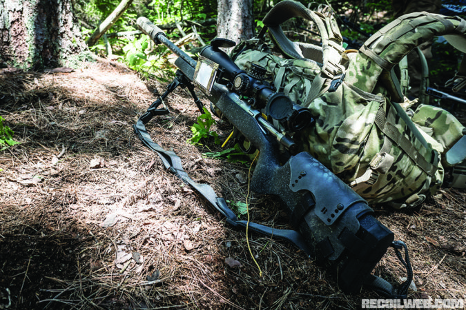 The author ran a lightweight hunting rig, a Proof Research Switch rifle in 6.5 Creedmoor with a Nightforce ATACR 5-25x56. The setup features a Savage barrel nut and an interchangeable bolt head for easy swaps between training, hunting, and competition configurations. 
