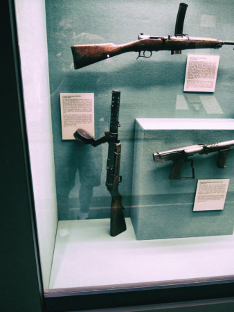 1. The German MP-18 submachine gun (left) was one of the first true portable small arms. It was introduced at the end of World War I. This display also includes an Italian Beretta Model 1918, another attempt at developing a submachine gun.