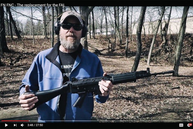 Tim Harmsen demonstrates use of a YHM Turbo 5.56 Silencer in this still from a video on his Military Arms Channel on YouTube. Under their new gun policy videos like this could be banned.