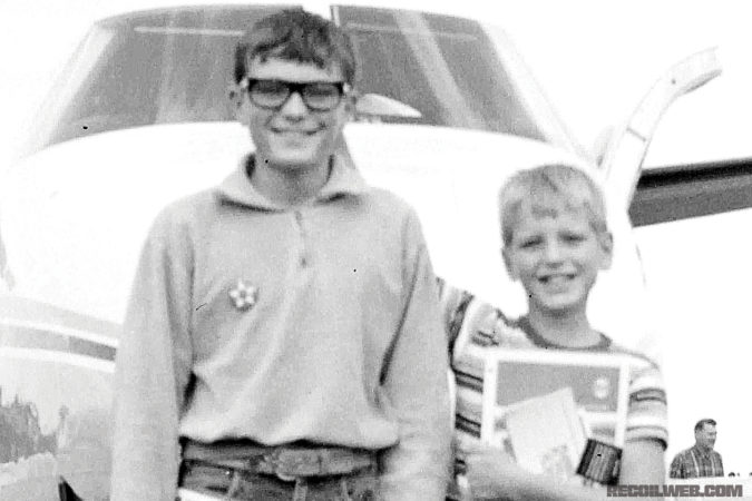 Age 13 with his brother Mark. The pair were dragged to countless air shows with their father, who was an aerobatic pilot.