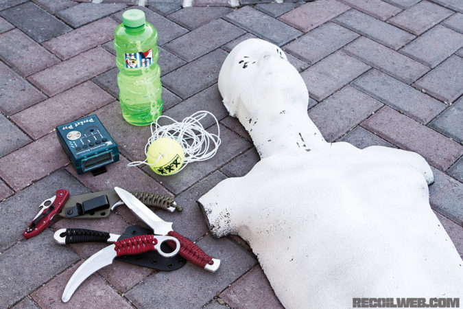 Some solo training tools pictured here include aluminum training blades, a shot timer, a tennis ball on a string, bubbles, and a Rubber Dummies 3D Silhouette Target. 