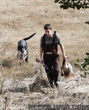 Coming in after a successful duck hunt with his dog Chief. This was Chief’s last retrieve.