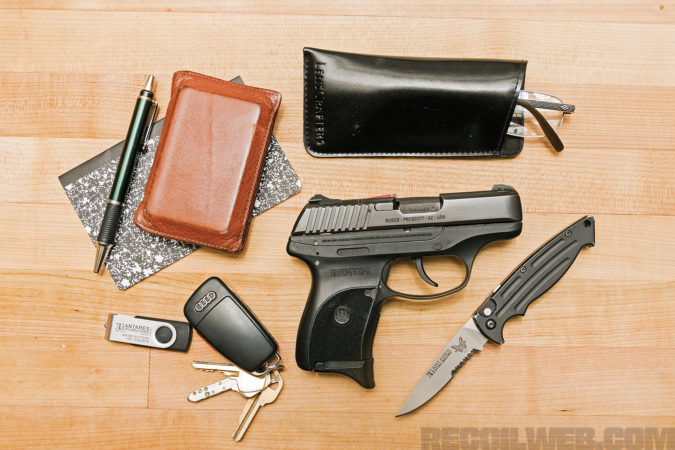 Philip's EDC: Ruger LC9, Benchmade Mini-Reflex, Notepad and Pen, Thumbdrive, Reading, Glasses, Wallet, and, no phone!