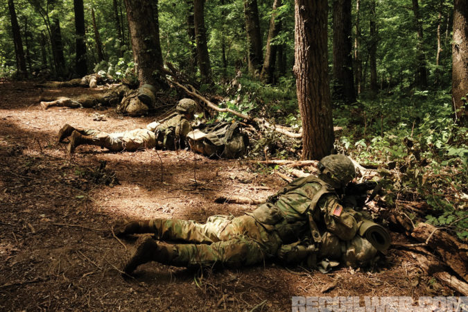 Cadets lay in wait for the opposing force (OPFOR) during their area defense exercise.
