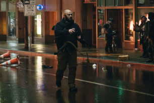 John Carughi on the streets of Seattle, disabling the recently retrieved police weapons.