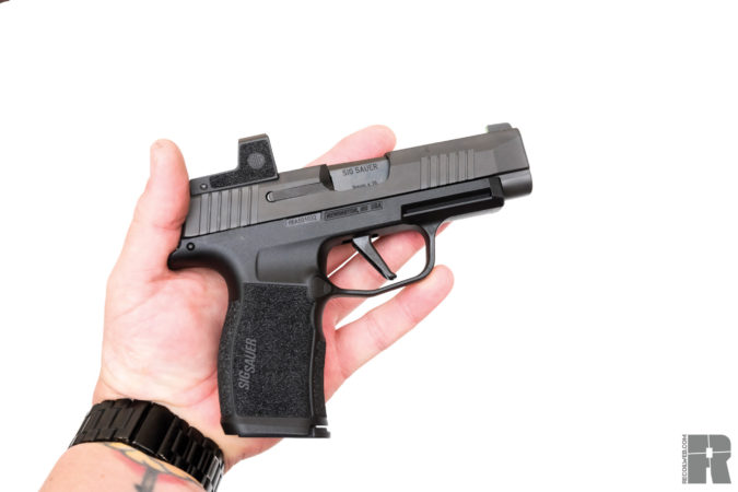 Sig P365 with red dot romeo SIg Sauer pocket sized pistol