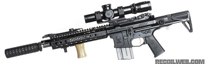 One very fancy suppressed AR-15 SBR, notice the total length.
