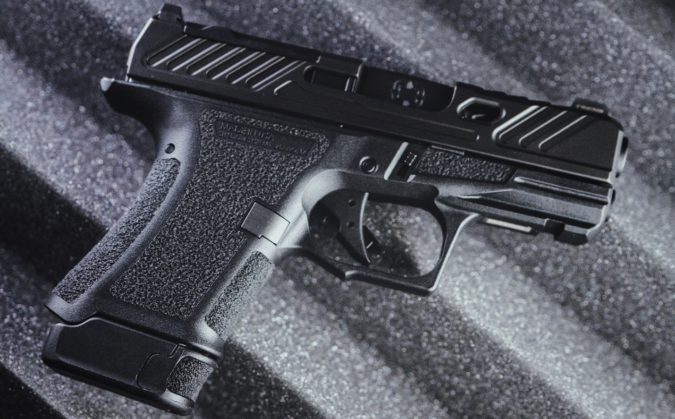 Shadow Systems CR920 with extended 13 round magazine. This is roughly the same size as a Glock 43 with a +1 extension on it, but holds 5-6 more rounds. 