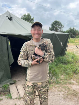 International Legion medic with rescued pupper