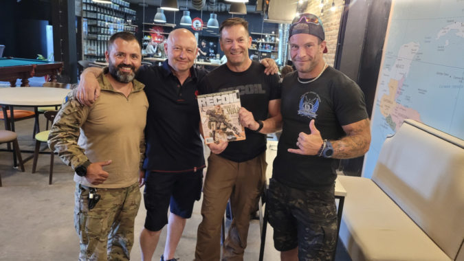 Ukrainian sniper instructors with the latest issue of RECOIL