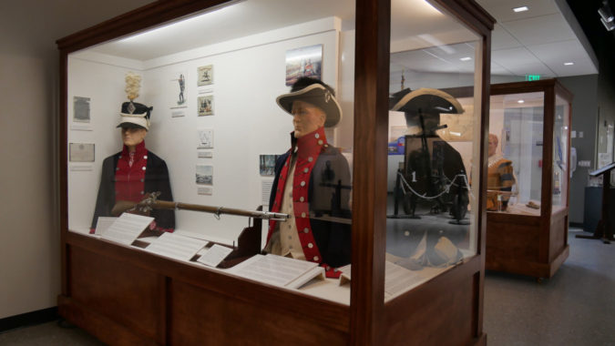 On the left is a War of 1812 display and on the right is a Whisky Rebellion, Early Republic display.
